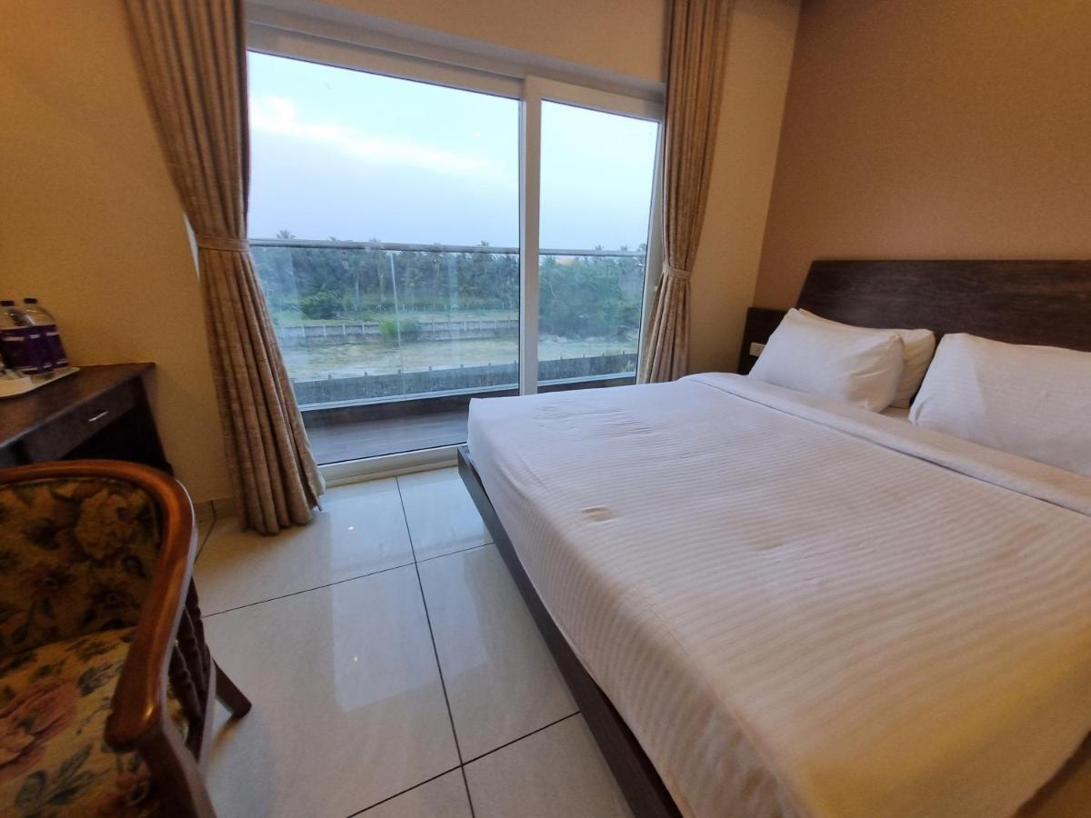 黎明之村 Plutus Residency酒店 外观 照片